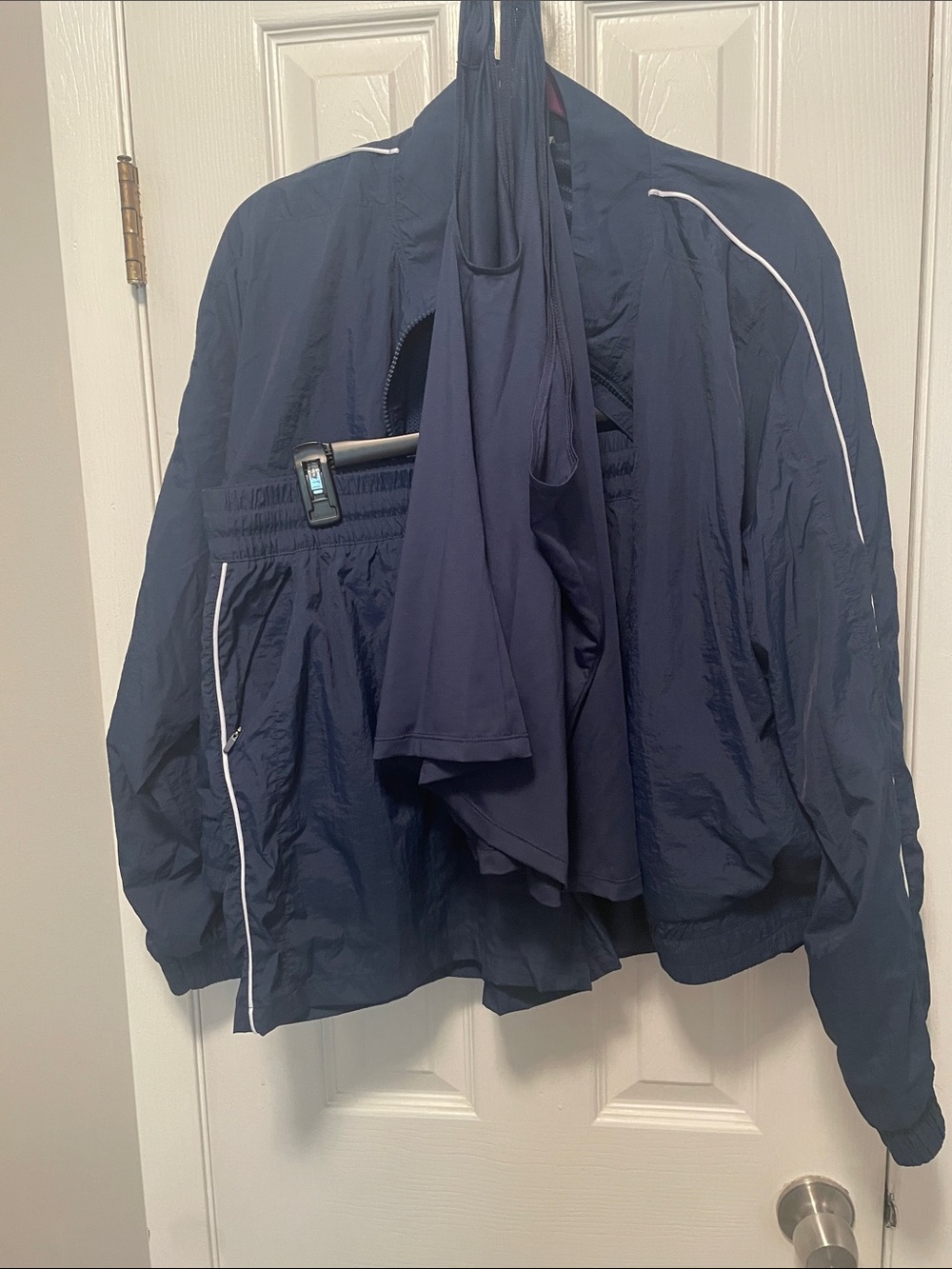 Xersion Navy Jacket with White Zipper Trim